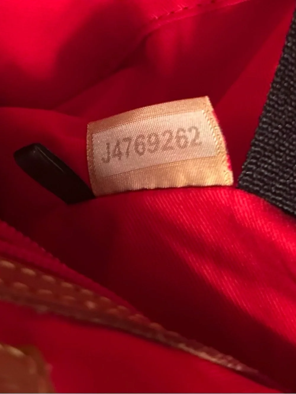 Dooney & Bourke signature brown 1975 DB logo coated canvas bucket bag